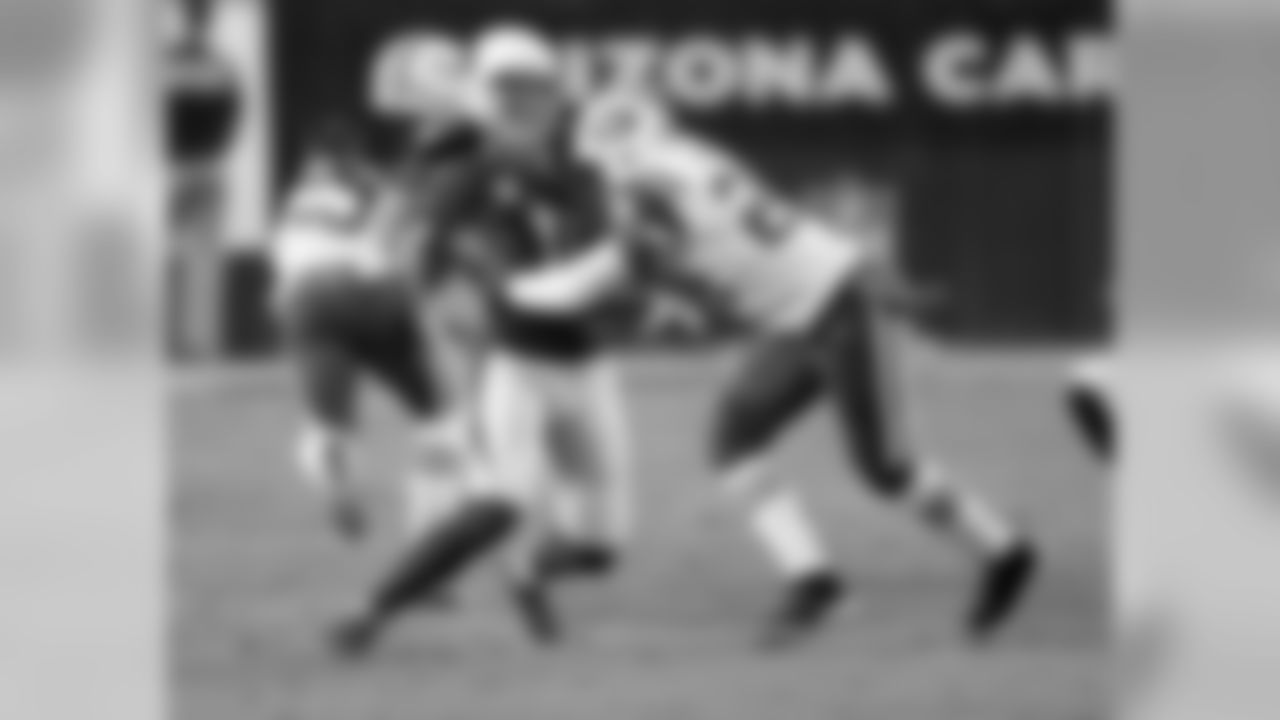 WR Larry Fitzgerald (left) and Jets CB Darrelle Revis (right)