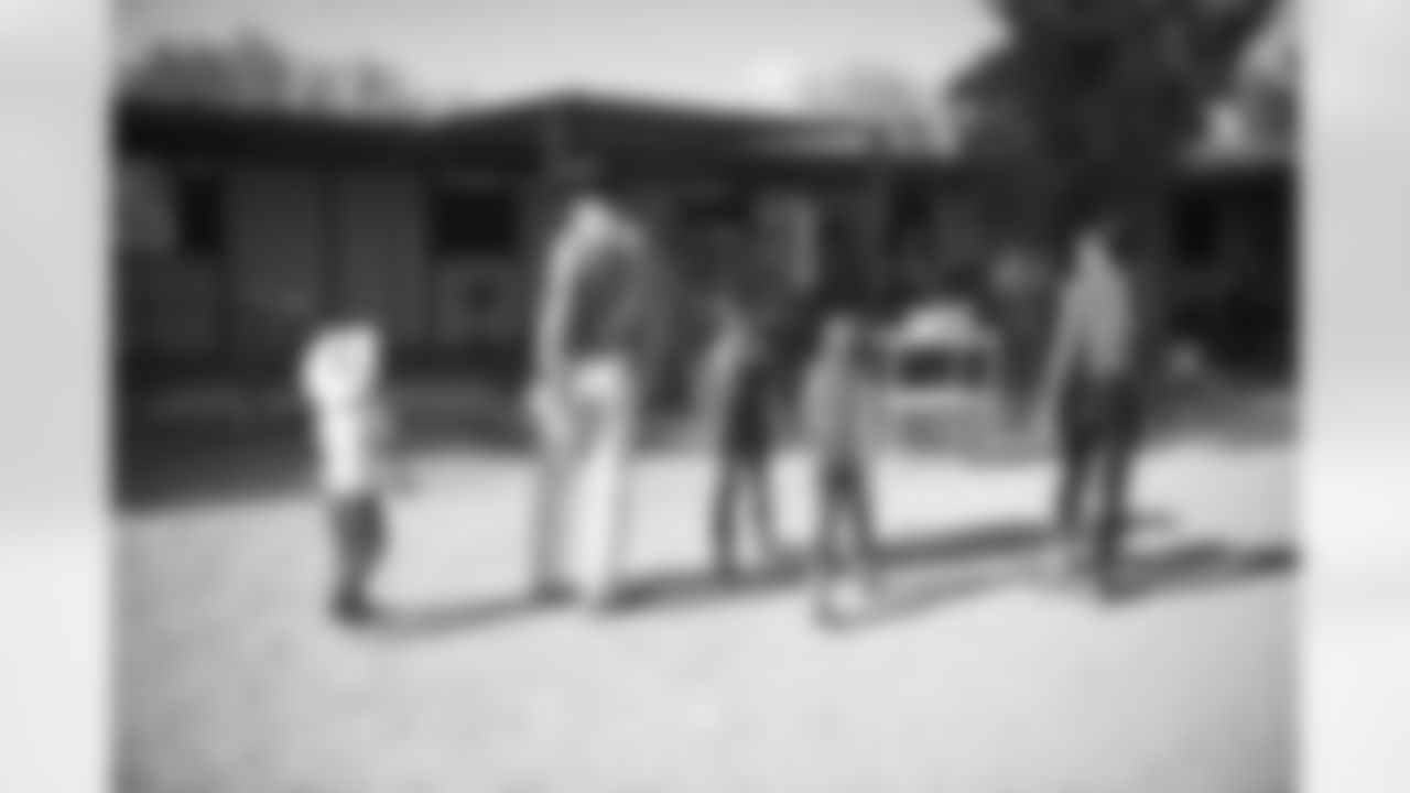 The Arizona Cardinals visit Hunkapi Farms to work with therapy horses and families with ALS on Saturday, May 13, 2023 in Scottsdale, AZ.