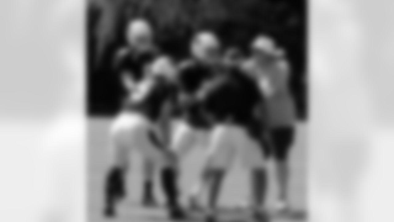 Carson Palmer goes through the QB gauntlet against Drew Stanton, Caleb TerBush, QB coach Freddie Kitchens and head athletic trainer Tom Reed
