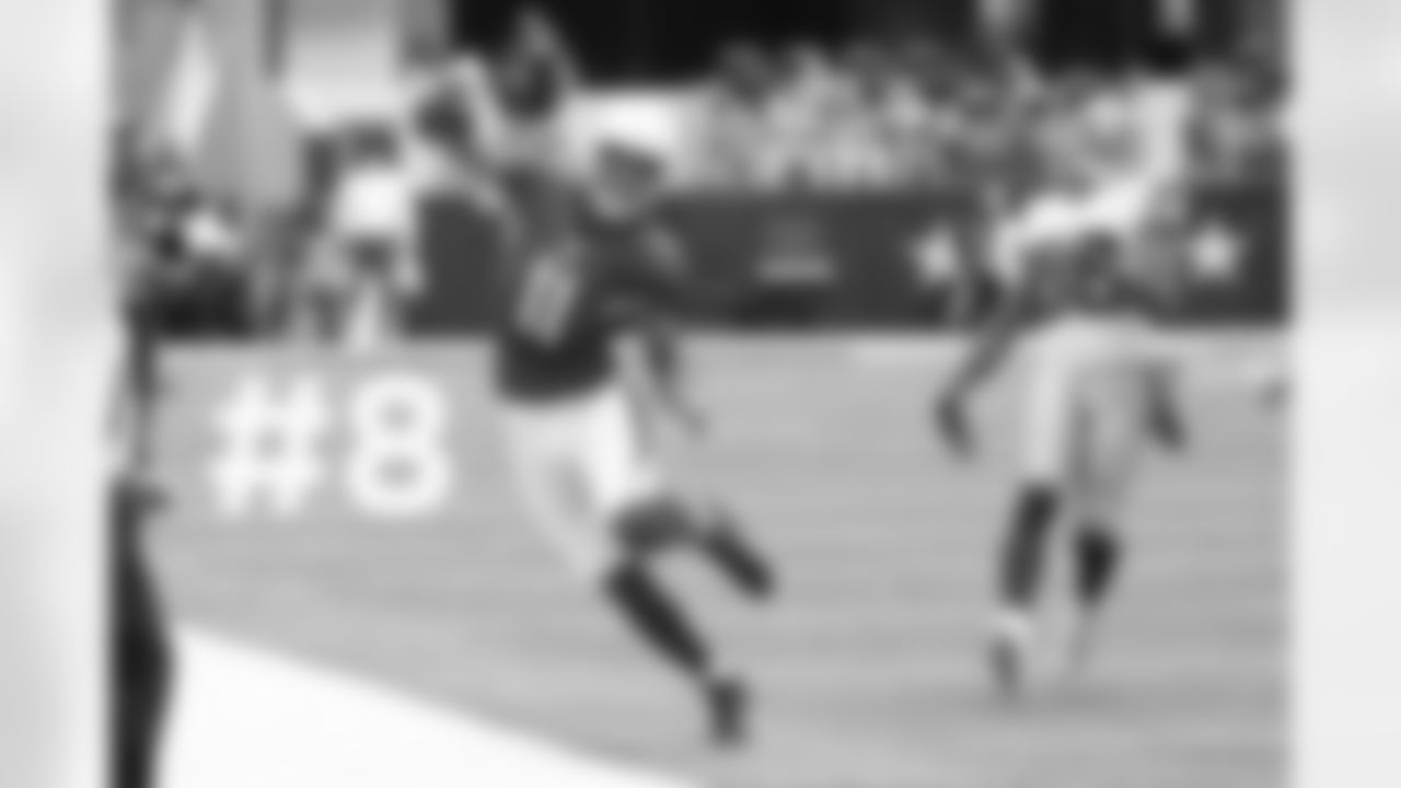 WR Larry Fitzgerald tries to stay in bounds