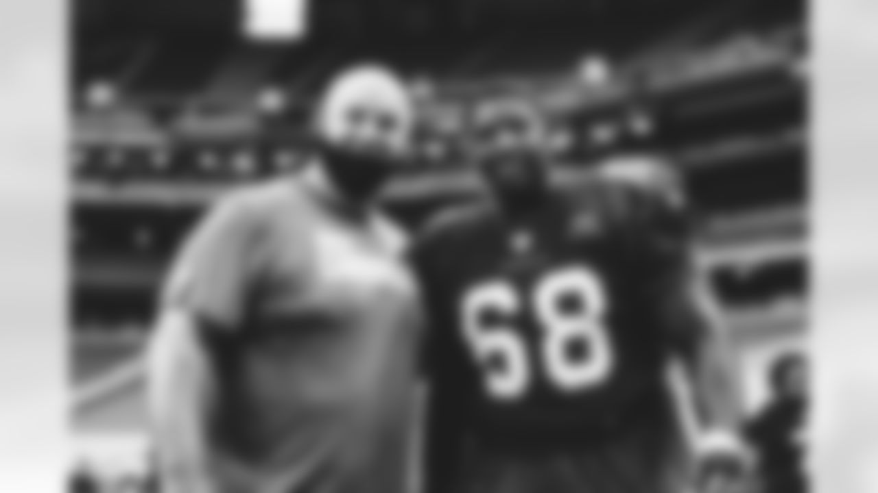 OL coach Sean Kugler (left) and T Kelvin Beachum