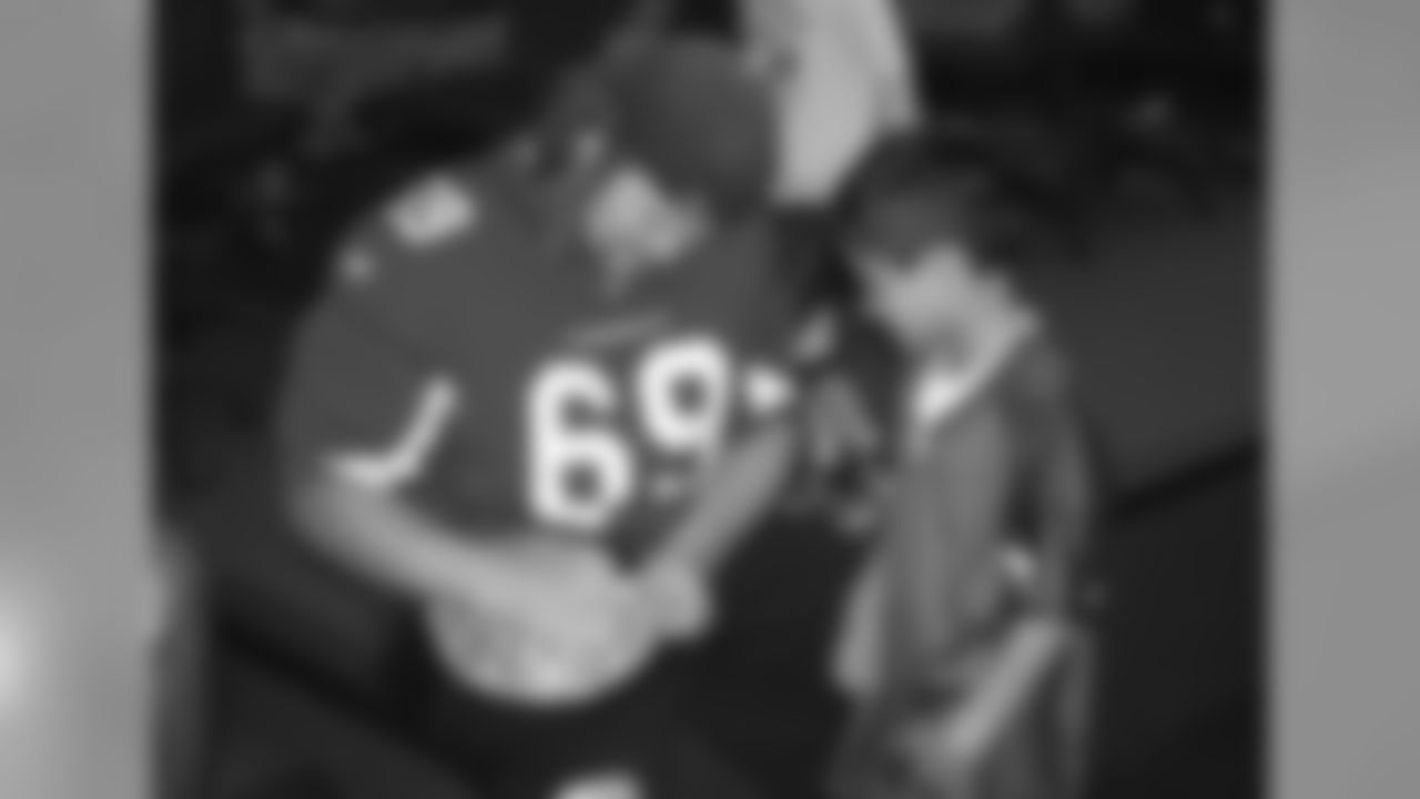 Mike Gibson signs an autograph