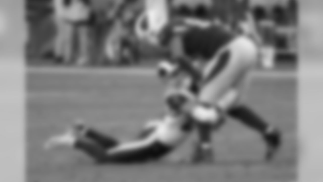 Rams safety Taylor Rapp hits Cardinals tight end Charles Clay during the first half.