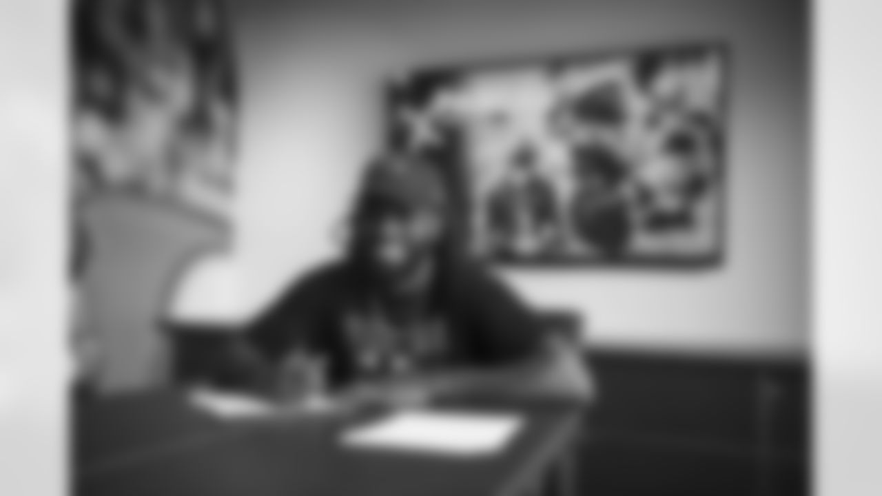 Wide receiver Zach Pascal signs a contract with the Arizona Cardinals at the Dignity Health Training Facility on Wednesday, March 22, 2023.