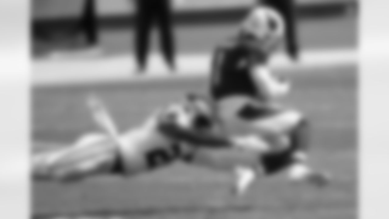 Arizona Cardinals quarterback Kyler Murray is tackled by Carolina Panthers outside linebacker Jeremy Chinn during the first half.