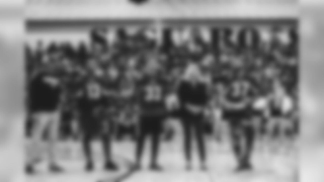 Photos from the Cardinals players' visit to a pep rally at their old high school.
