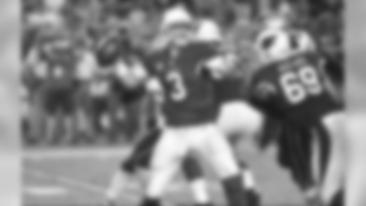 QB Carson Palmer delivers a pass against the Patriots