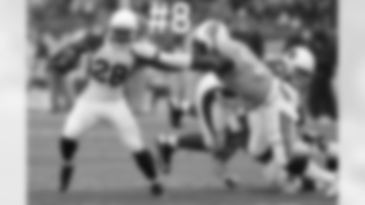 RB Rashard Mendenhall throws a stiff-arm.