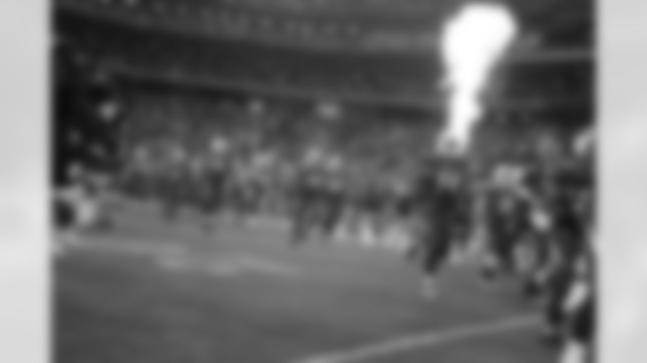 2010 vs. Cowboys: Players run out during introductions.
