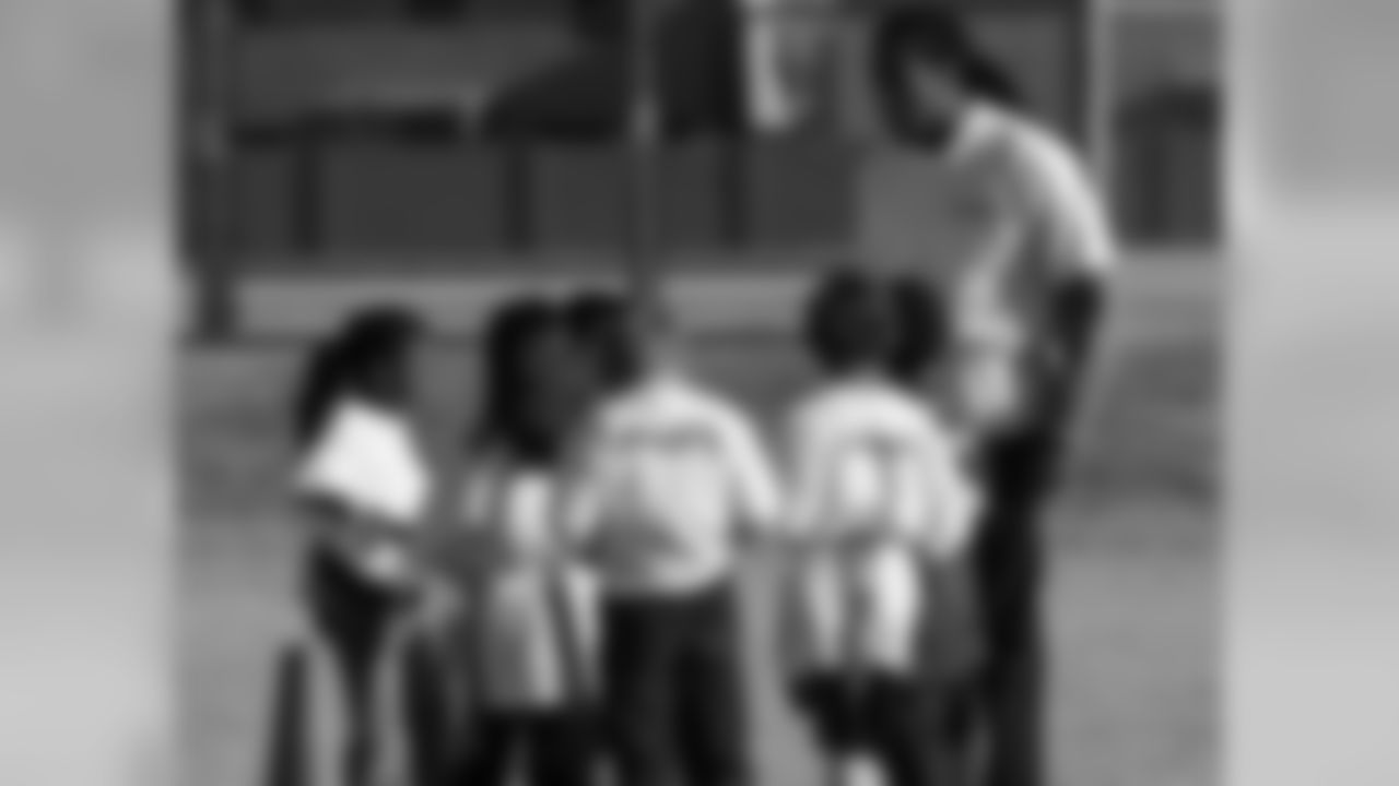 Larry plays with Jacobs class on the playground