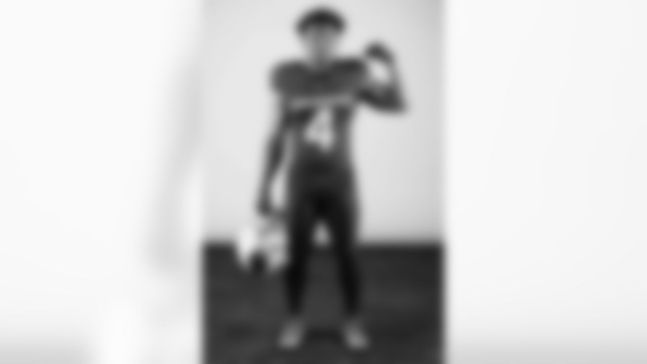 Arizona Cardinals wide receiver Rondale Moore (4) poses for a photo during a photoshoot for the 2023 Arizona Cardinals Uniforms on Thursday, April 13, 2023.