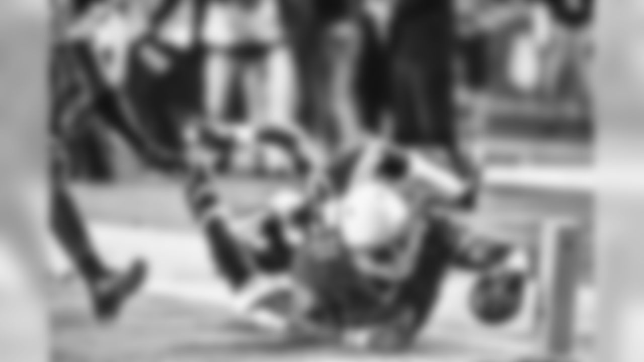 Johnson dives for the pylon last week against the Vikings
