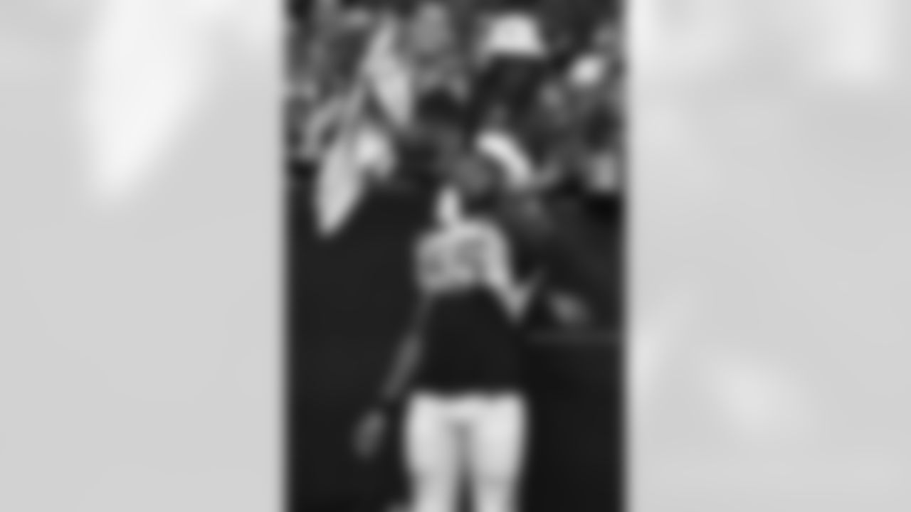 LB Chandler Jones poses with fans for a photo
