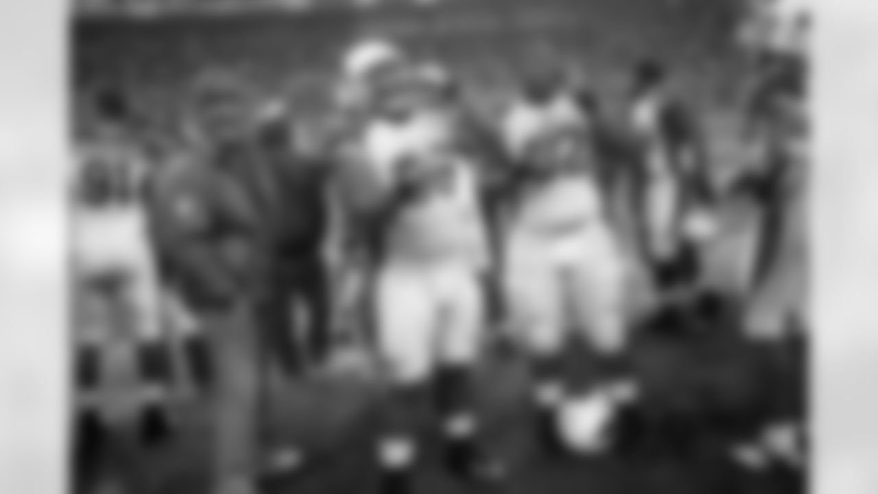 DT Alameda Ta'amu and DT Dan Williams celebrate the road win over the Seahawks.