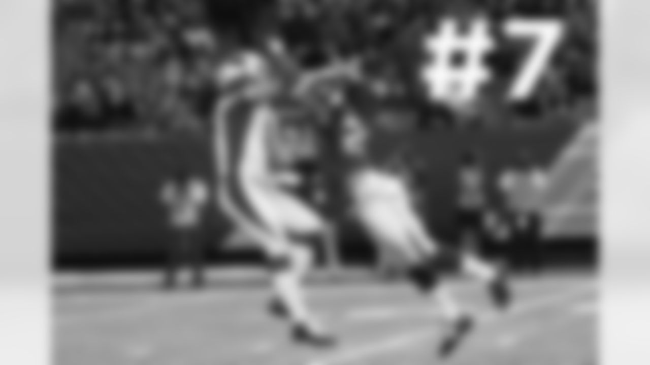 QB Drew Stanton passes the ball as Falcons S Dwight Lowery leaps toward him