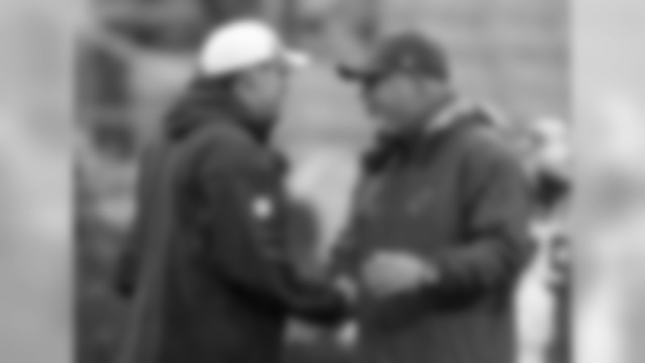 Coach Bruce Arians meets with Panthers coach Ron Rivera