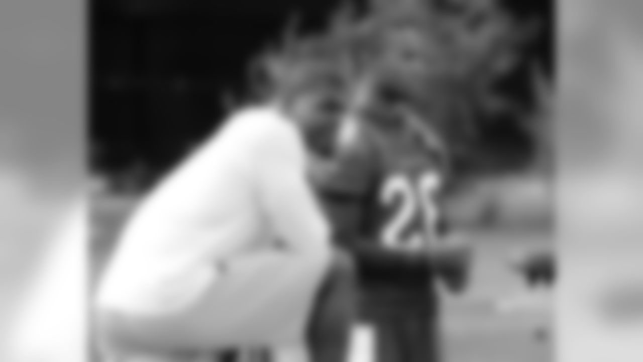 Adrian Wilson (left) with CB Justin Bethel