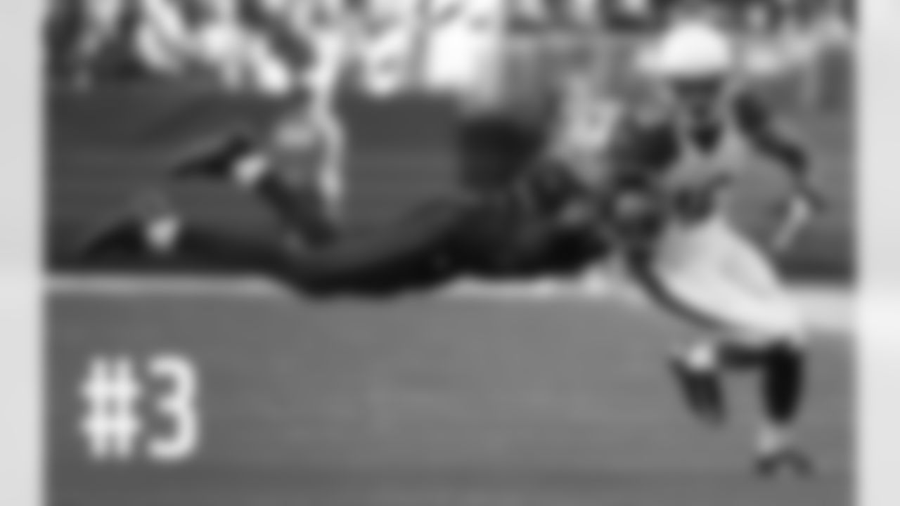 WR John Brown tries to get away from 49ers CB Kenneth Acker