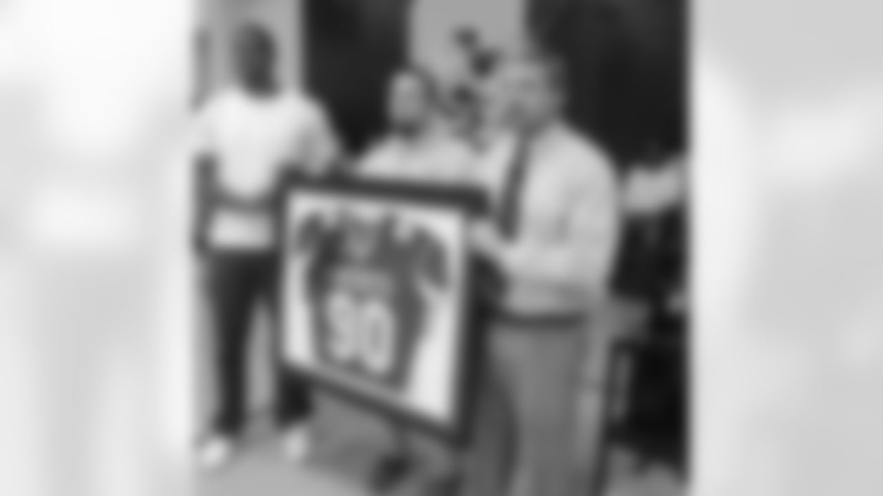 DE Kareem Martin (@kjmartin96) gets his high school jersey framed