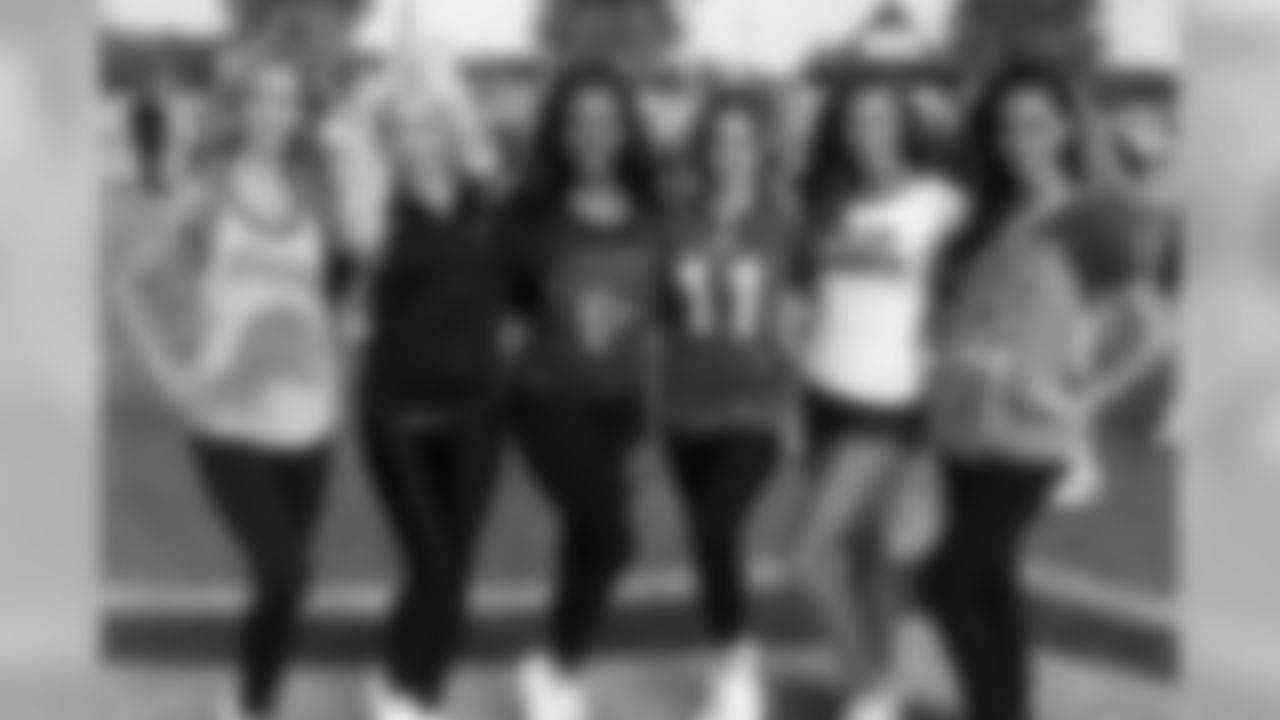 Alexandria (second from left) with a few other NFC cheerleaders