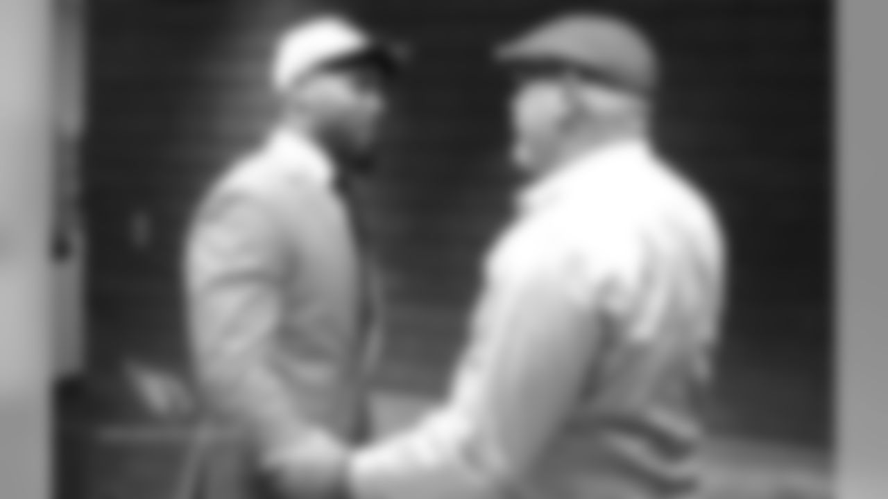 Reddick is greeted by Bruce Arians