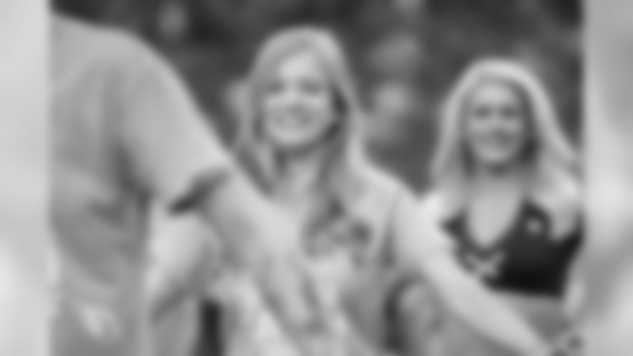 Images from halftime of the Falcons game, where Cardinals cheerleaders performed with cancer survivors and their caregivers to raise awareness for early detection and prevention