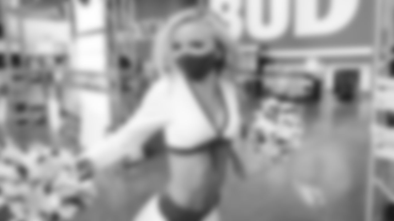 Images of the Cardinals cheerleaders during the Week 3 matchup against the Lions.