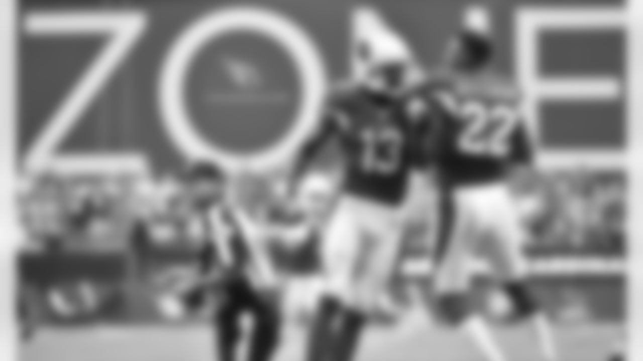 WR Jaron Brown celebrates his touchdown against Tampa Bay with S Tony Jefferson