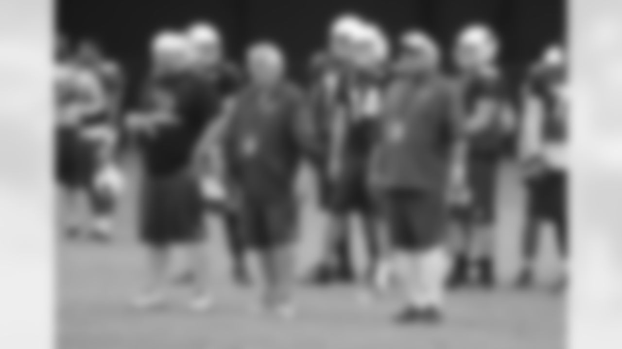 QB coach Freddie Kitchens, assistant head coach Tom Moore and head coach Bruce Arians