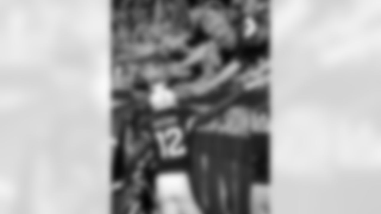 WR John Brown celebrating his touchdown with fans