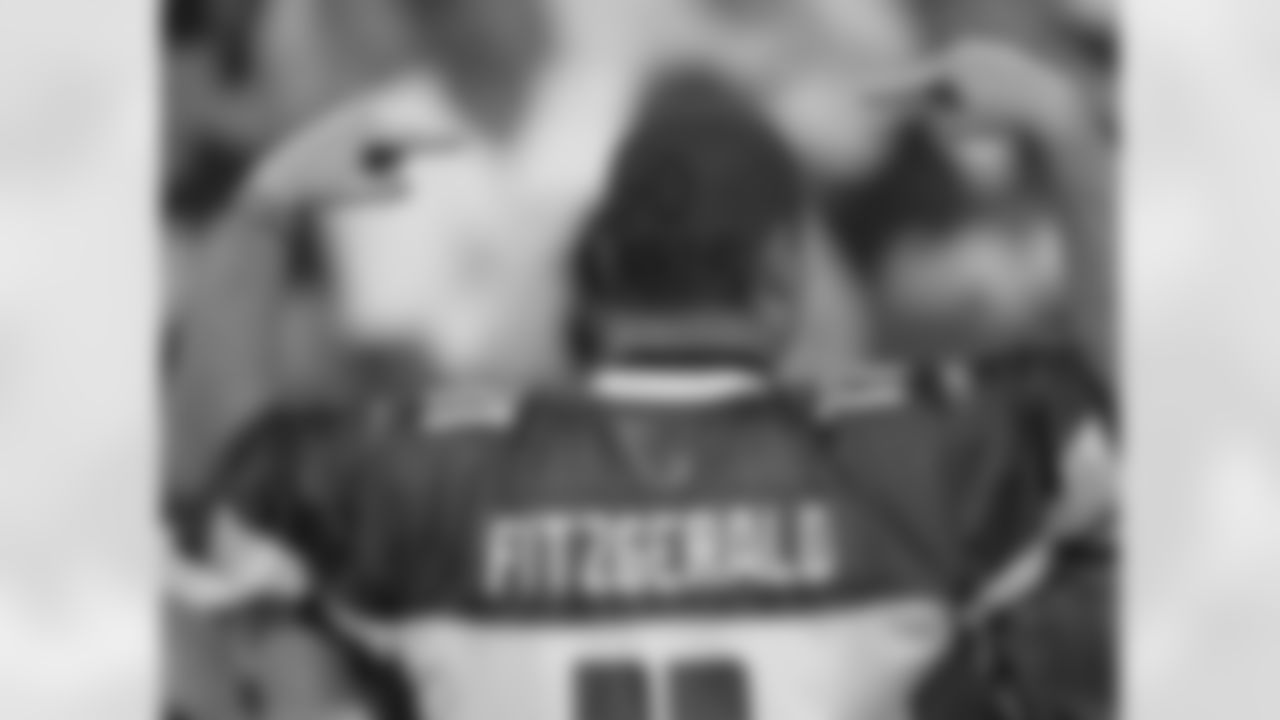 A Cards fan shows off his hair