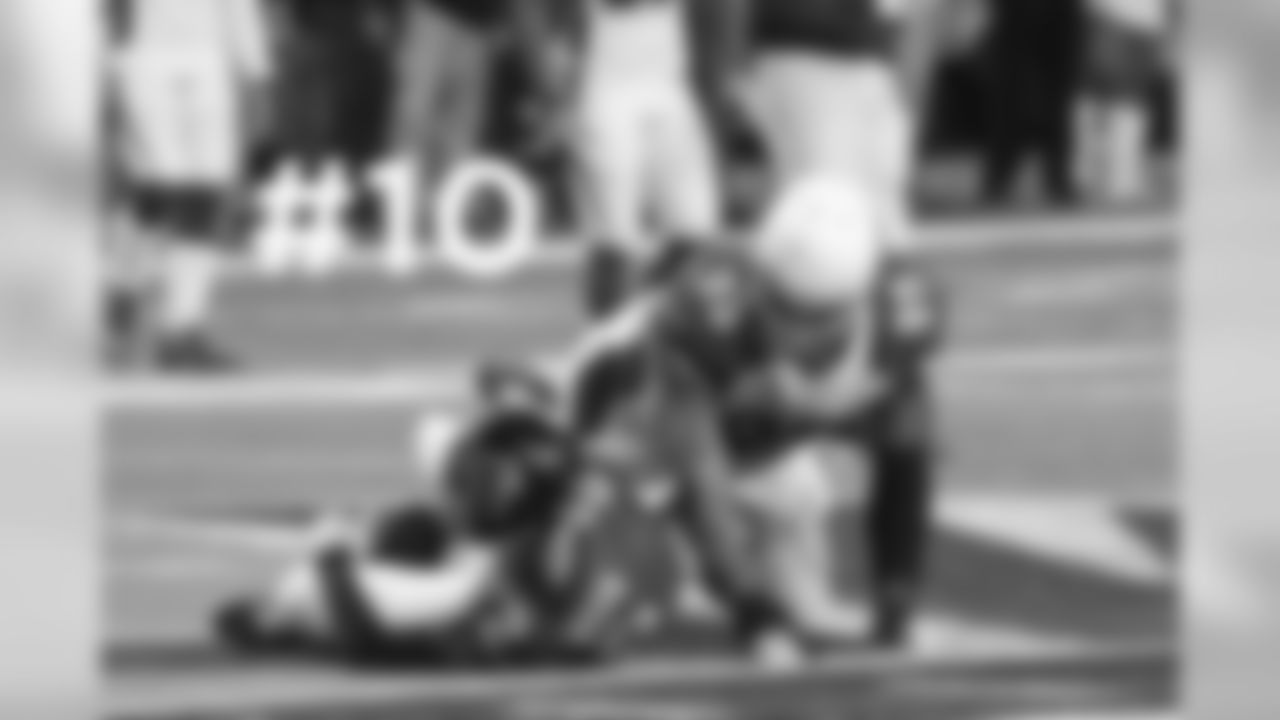 DT Tommy Kelly pressures Falcons QB Matt Ryan