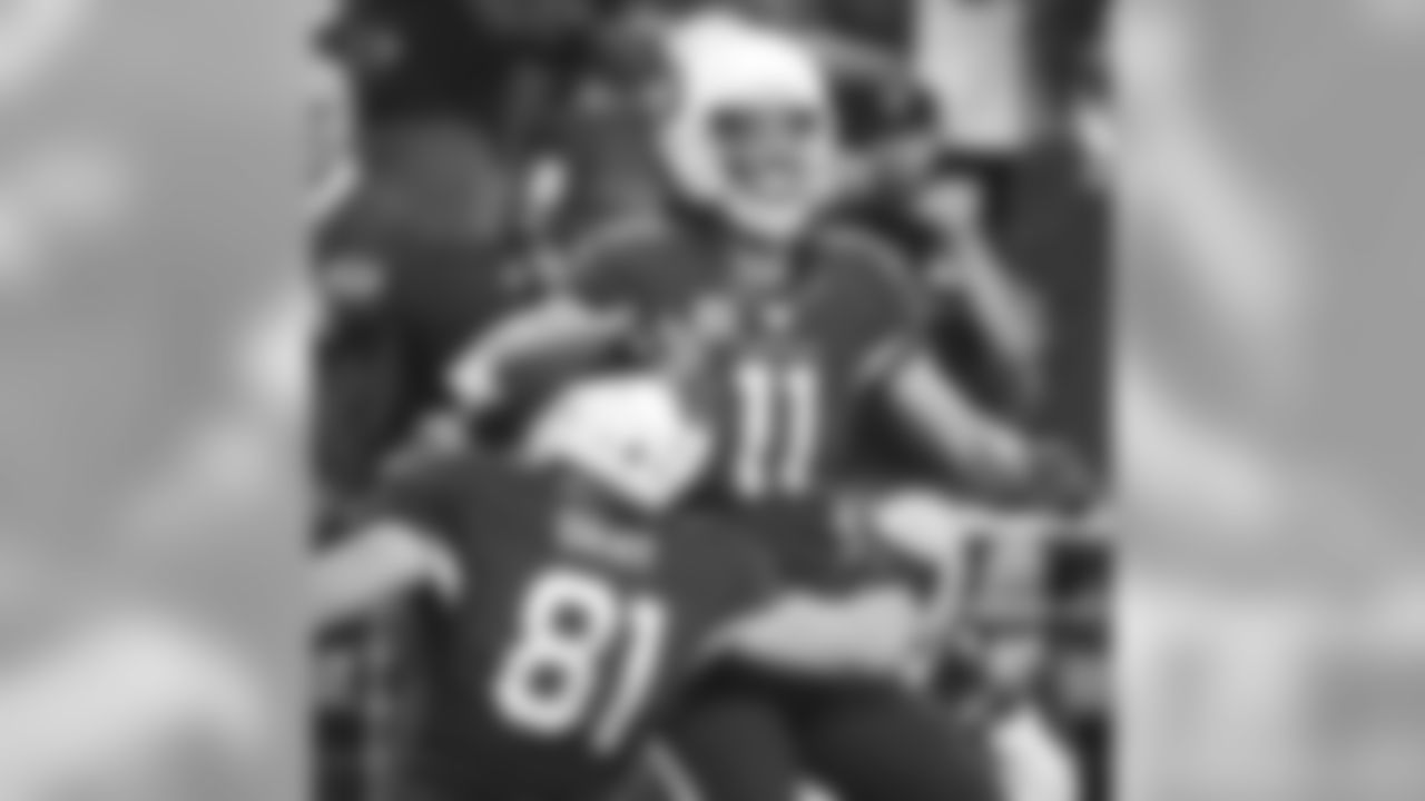 The Cardinals beat the Colts. WR Larry Fitzgerald and TE Jim Dray celebrate a Fitz TD.