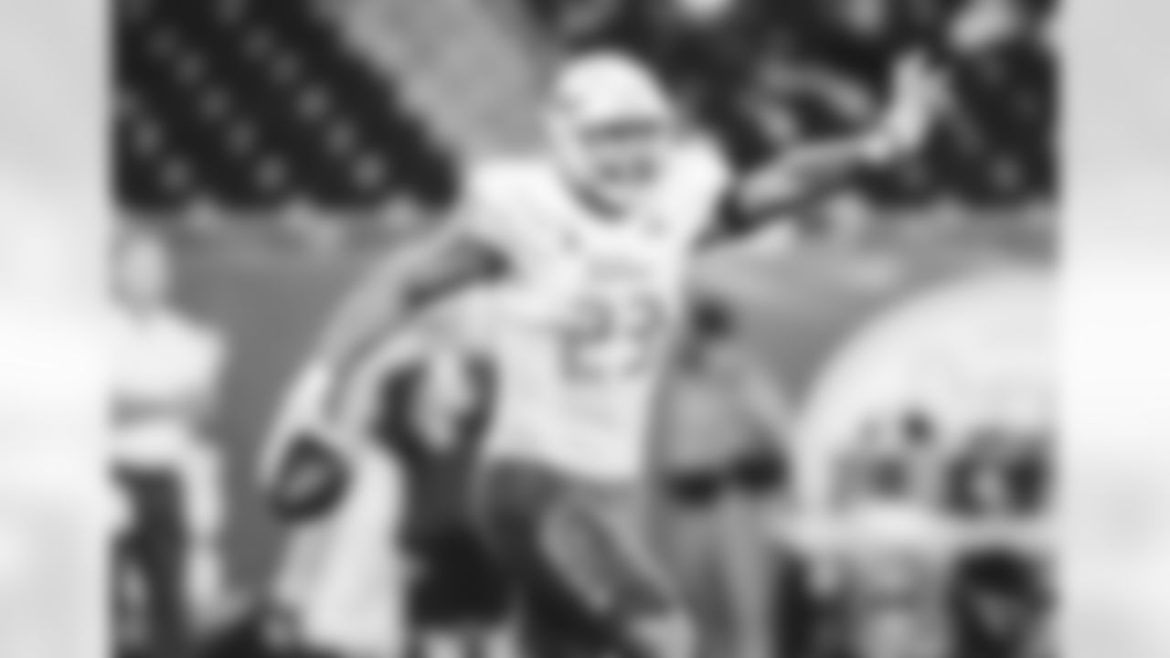 Images of Tulsa linebacker Zaven Collins, who the Cardinals selected with the No. 16 overall pick in the draft.