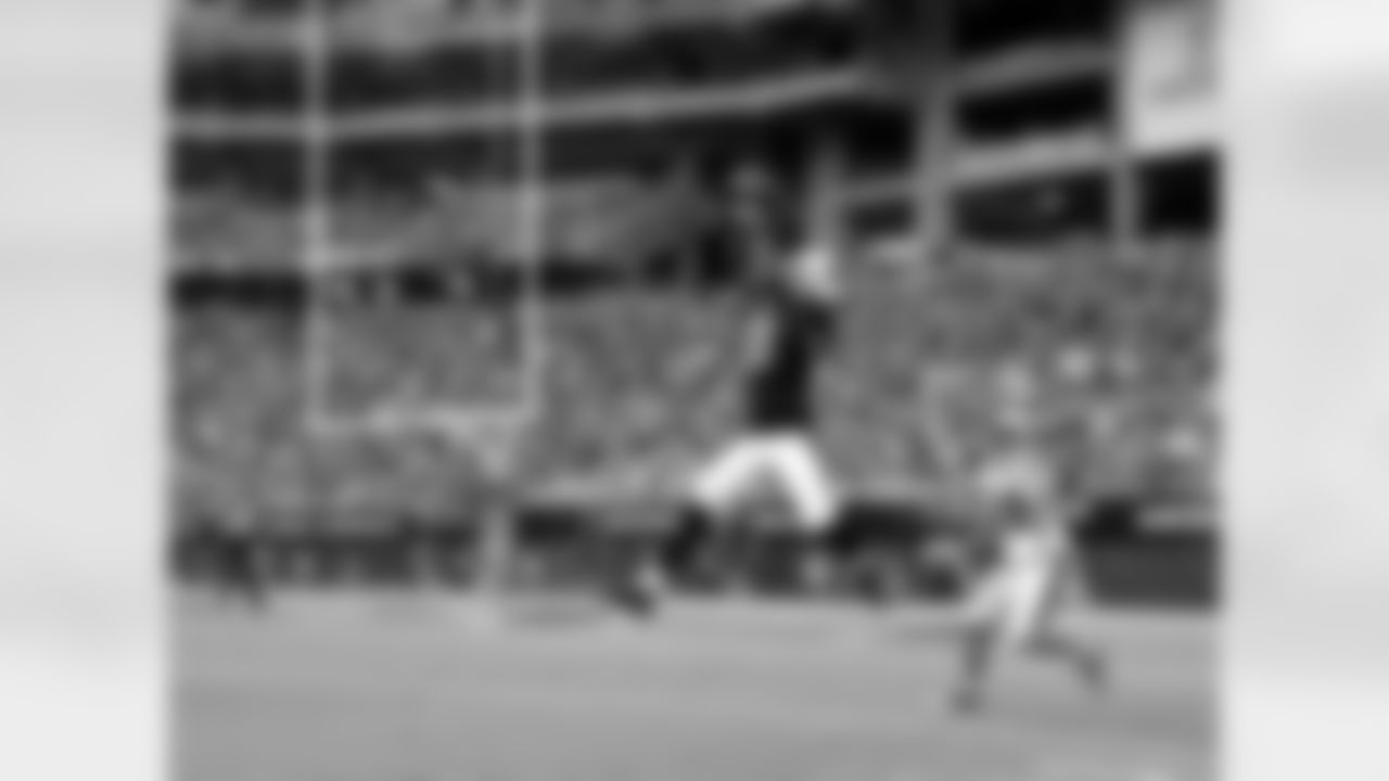 Peterson intercepts a pass intended for Panthers WR Steve Smith