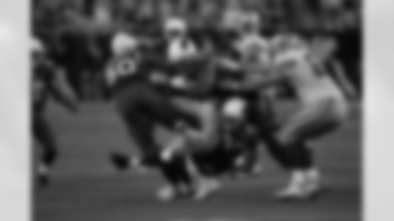 The Cards gang tackle Jason Witten