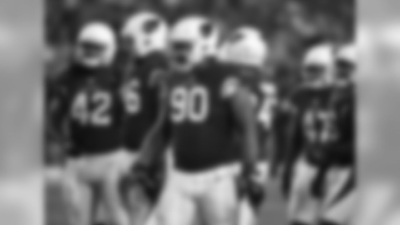 DT Robert Nkemdiche and the defense prepare for the snap