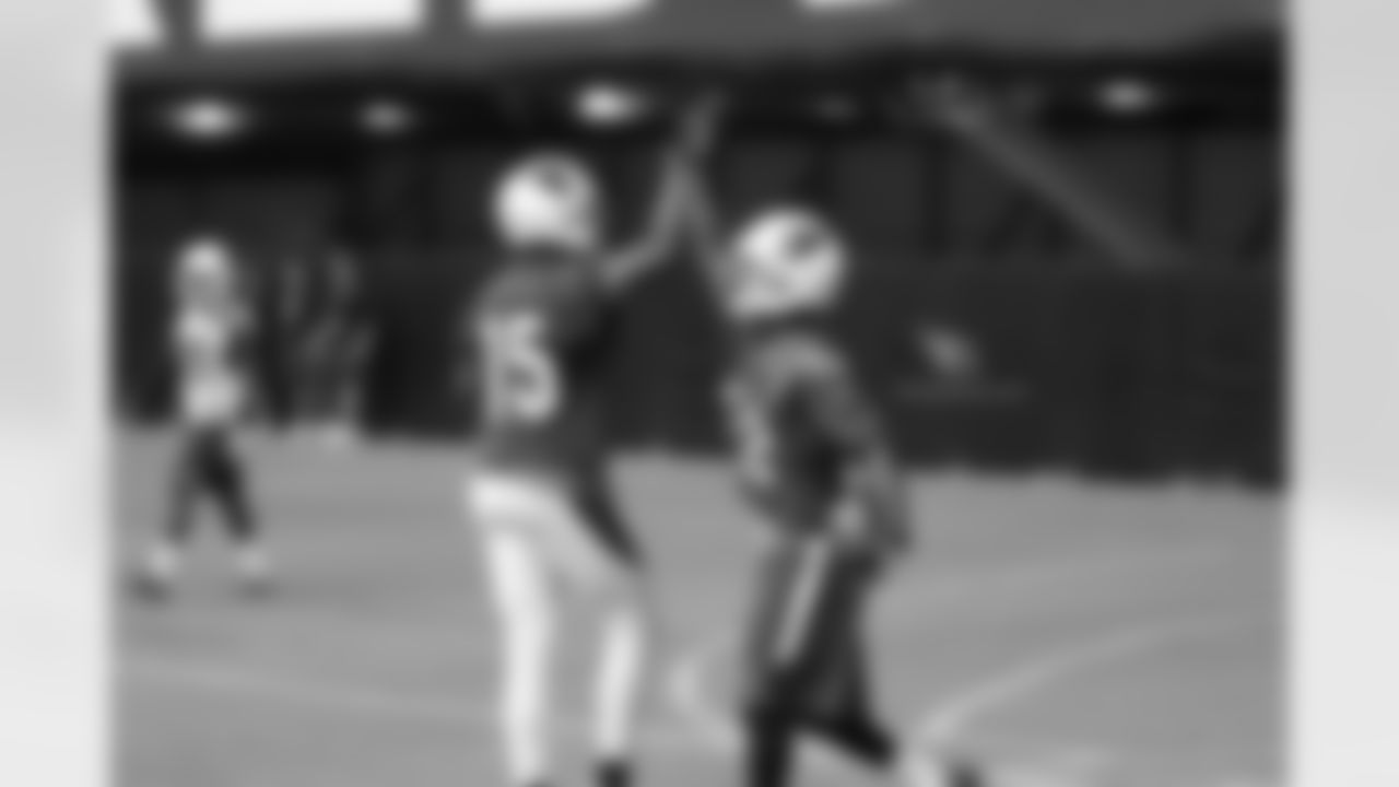 WR Michael Floyd (left) and WR John Brown high-five