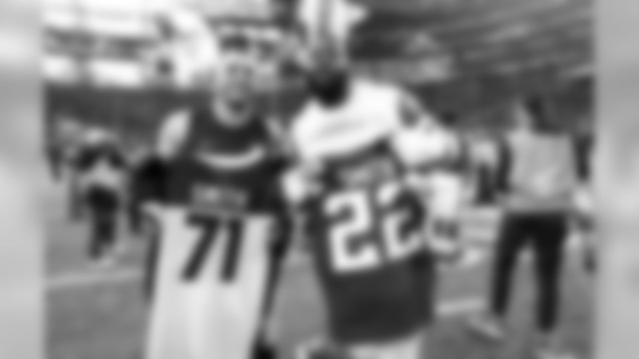 Minnesota Vikings free safety Harrison Smith, left, poses for a photo with Arizona Cardinals offensive tackle Andre Smith after an NFL football game, Sunday, Oct. 14, 2018, in Minneapolis. The Vikings won 27-17.