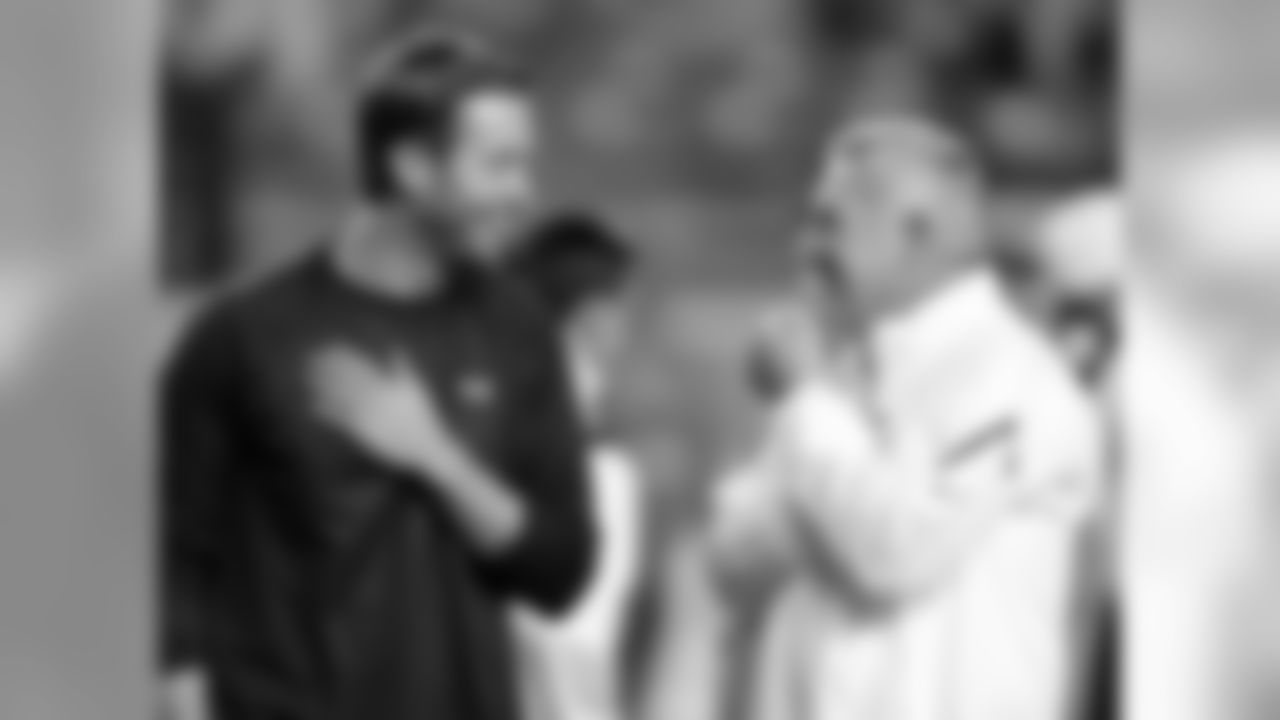 Texas Tech coach Kliff Kingsbury, left, talks with Texas coach Mack Brown, right, before an NCAA college football game on Thursday, Nov. 28, 2013, in Austin, Texas.