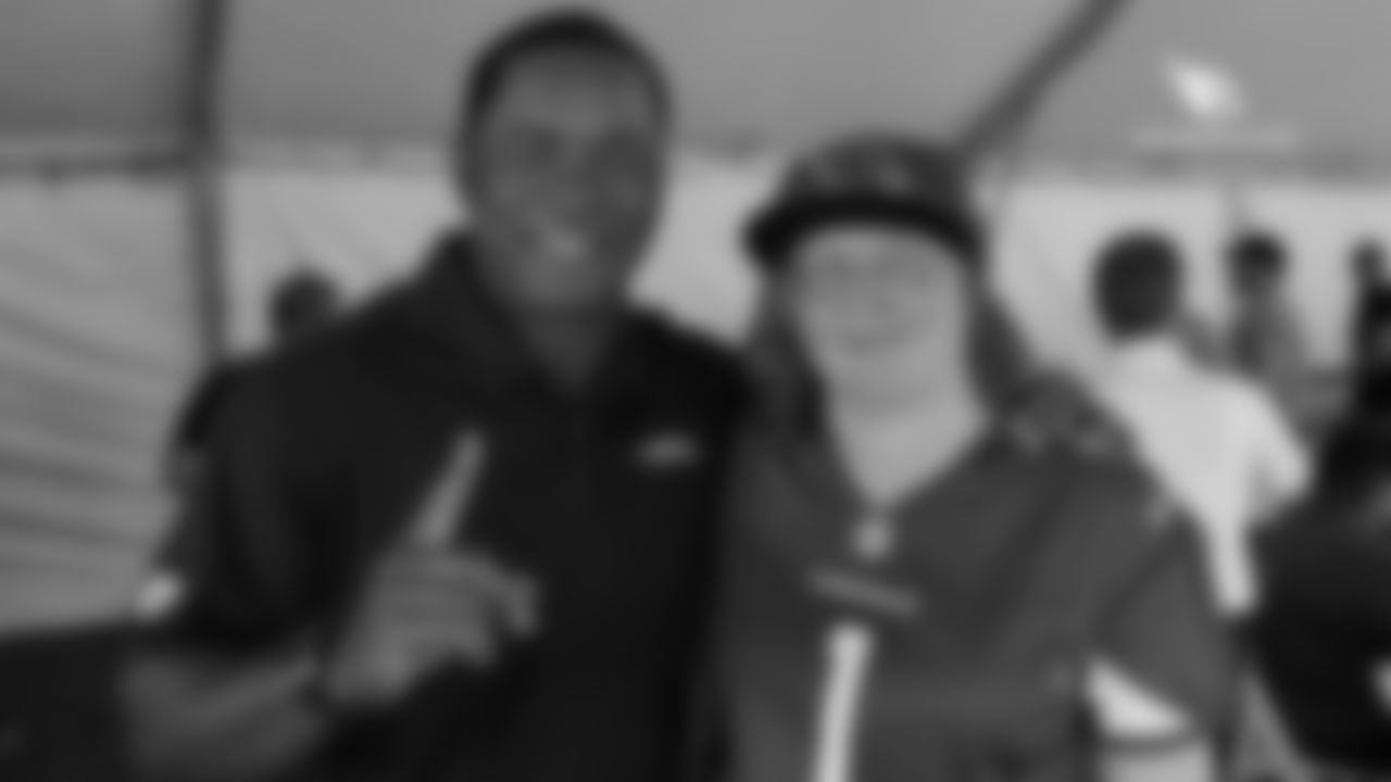 WR Frank Sanders with a fan during the the Cardinals' draft party outside State Farm Stadium last Thursday