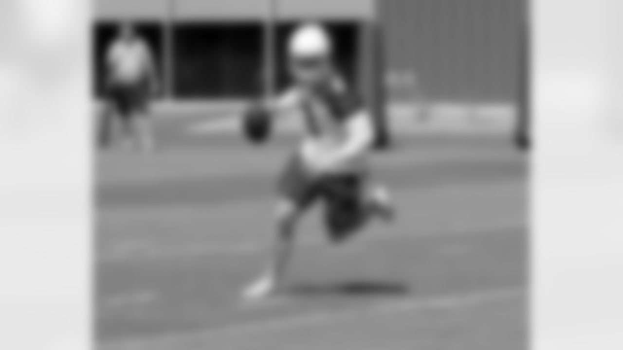 P Drew Butler works on the 'fire' field goal drill