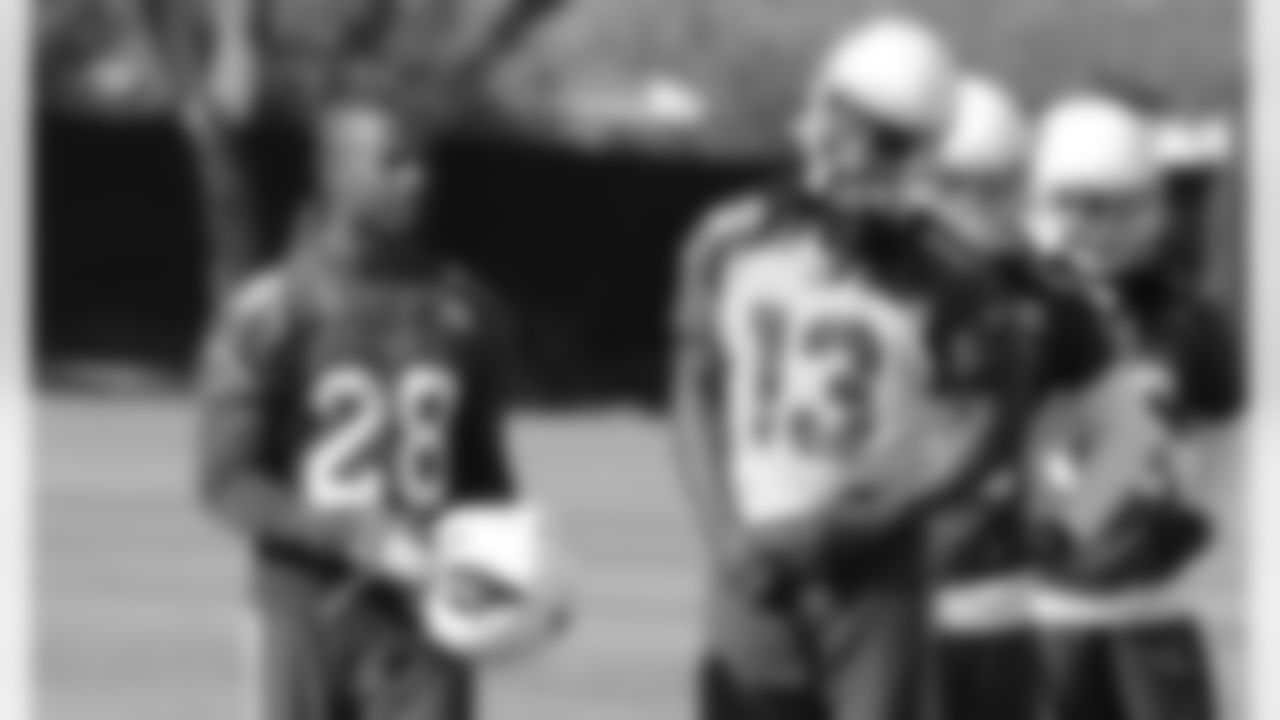 CB Justin Bethel (left) with WR Jaron Brown