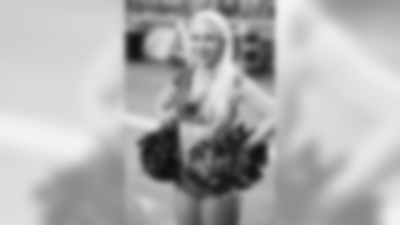 Images of Cardinals cheerleader Davis during the 2019 season