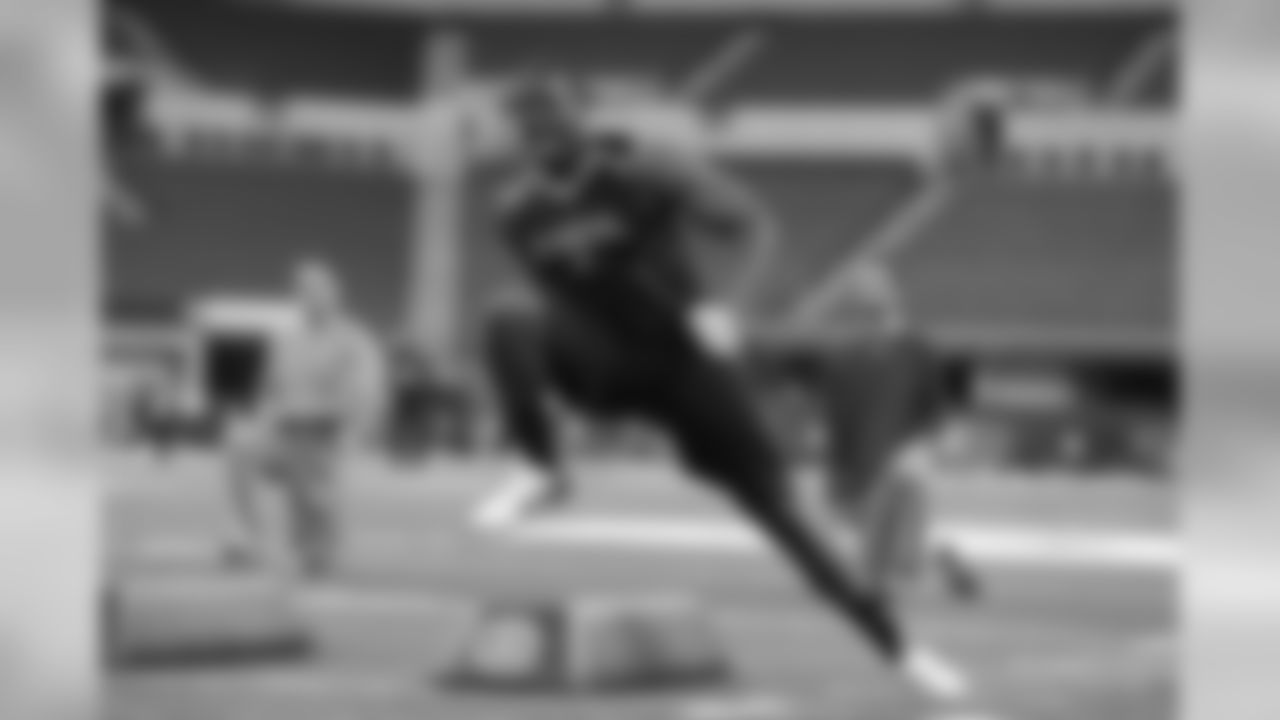 DE Kareem Martin works out at the NFL Scouting combine on Feb. 24, 2014