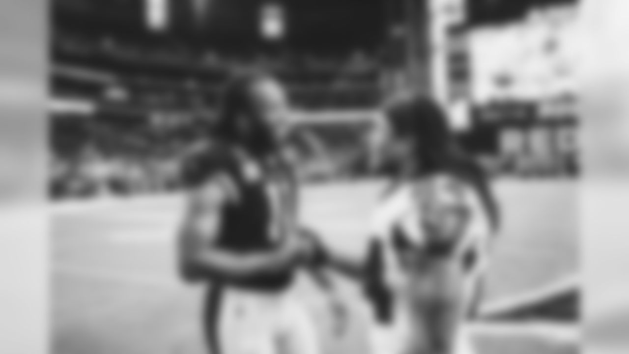 WR Larry Fitzgerald with Falcons RB Devonta Freeman