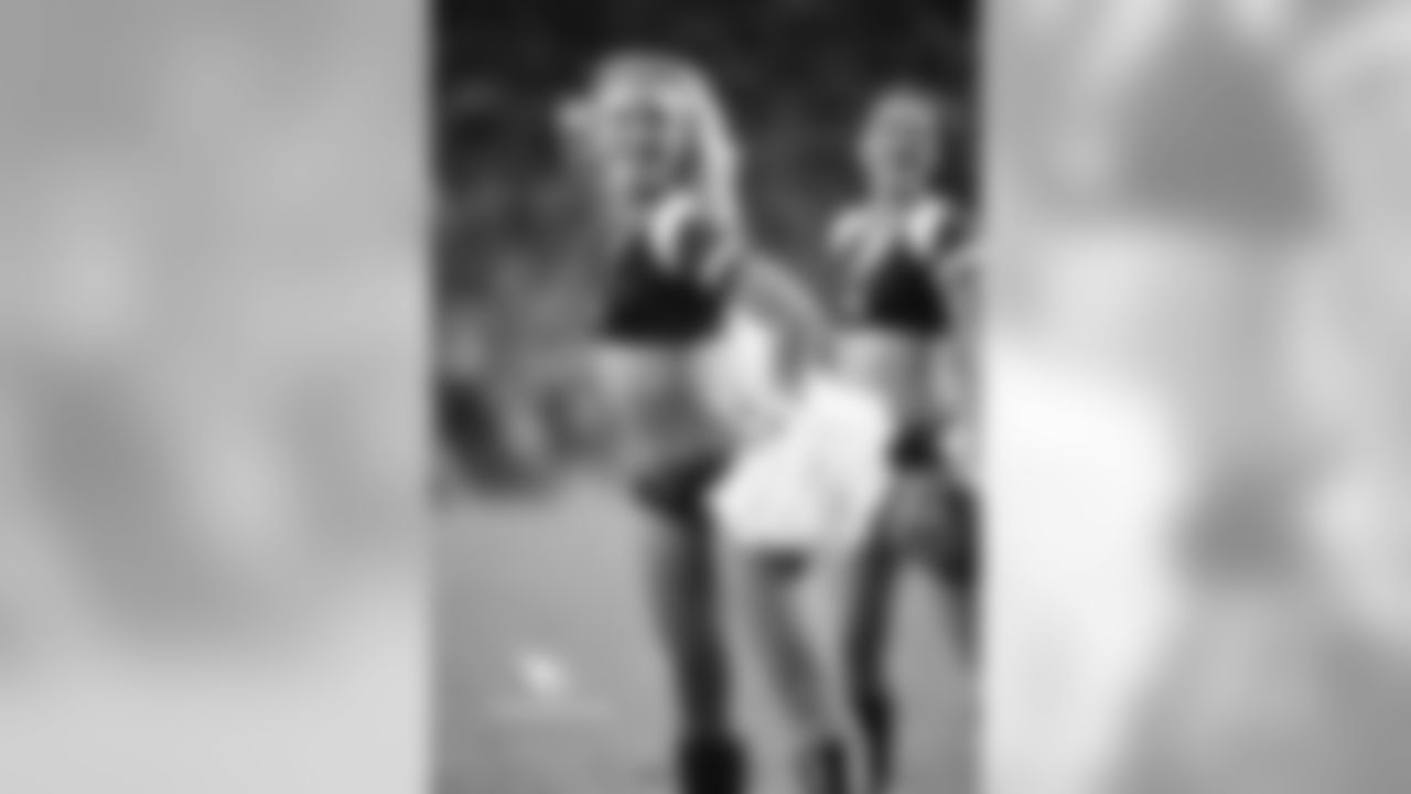 Images of Cardinals cheerleader Davis from the 2018 season