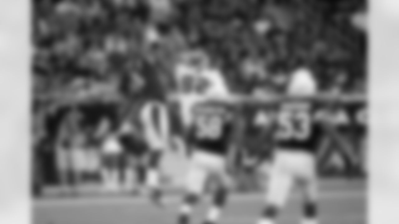 Wilson deflects a Carson Palmer pass