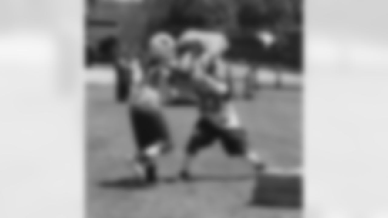 William Powell (33) works on pass blocking