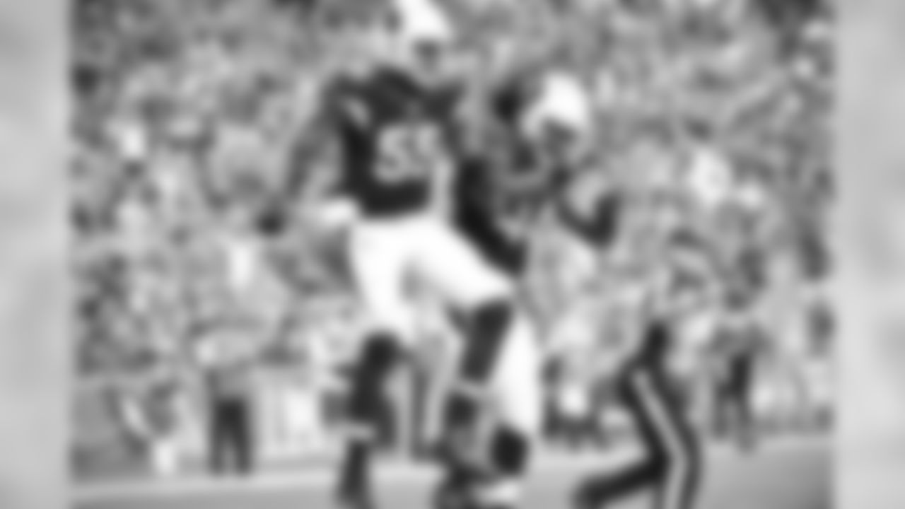 LB Chandler Jones (left) and LB Markus Golden celebrate a play against the Rams